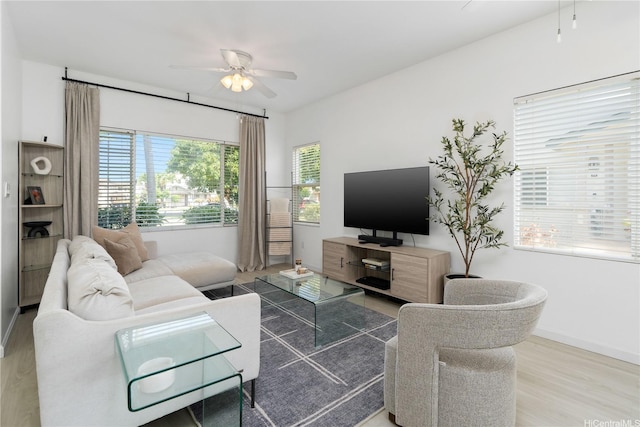 91-1059 Kaimalie St Unit 2P1, Ewa Beach, HI 96706 - living room featuring ceiling fan and wood finished floors