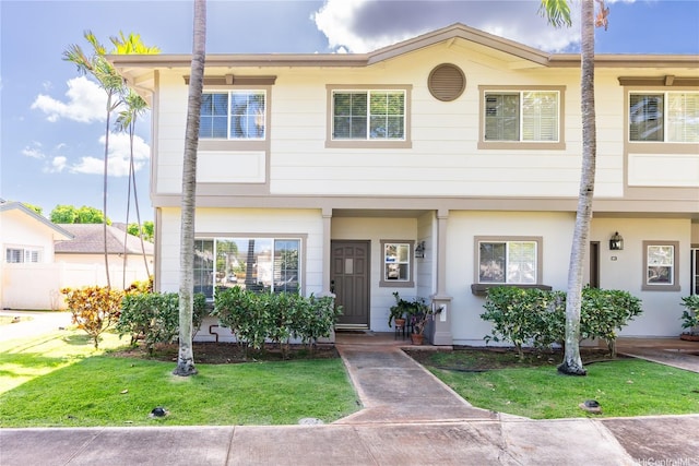91-1059 Kaimalie St Unit 2P1, Ewa Beach, HI 96706 - view of property featuring a front lawn