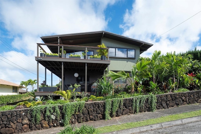 1875 Kualono St, Honolulu, HI 96817 - rear view of house featuring a balcony