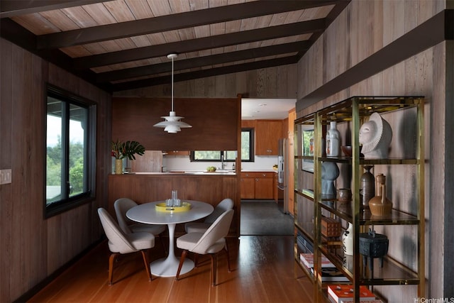1875 Kualono St, Honolulu, HI 96817 - dining space with wooden walls, wood ceiling, dark wood-style flooring, and healthy amount of natural light