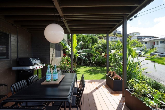 1875 Kualono St, Honolulu, HI 96817 - wooden terrace with outdoor dining area and grilling area