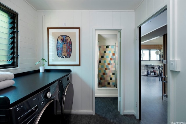 1875 Kualono St, Honolulu, HI 96817 - washroom featuring separate washer and dryer, dark carpet, and baseboards