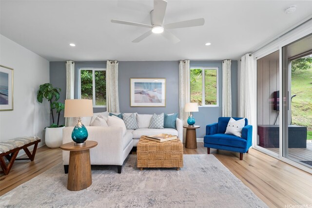 3657 Woodlawn Dr, Honolulu, HI 96822 - living room with wood finished floors, plenty of natural light, a ceiling fan, and recessed lighting