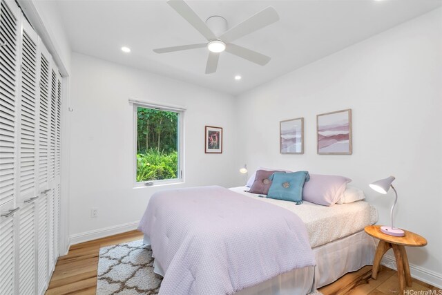3657 Woodlawn Dr, Honolulu, HI 96822 - bedroom with wood finished floors, a closet, recessed lighting, and a ceiling fan