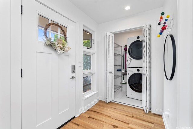 3657 Woodlawn Dr, Honolulu, HI 96822 - washroom featuring estacked washer and dryer and light wood finished floors