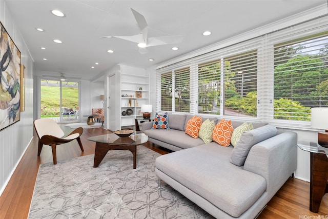 3657 Woodlawn Dr, Honolulu, HI 96822 - living room with wood finished floors, recessed lighting, a ceiling fan, and built in shelves