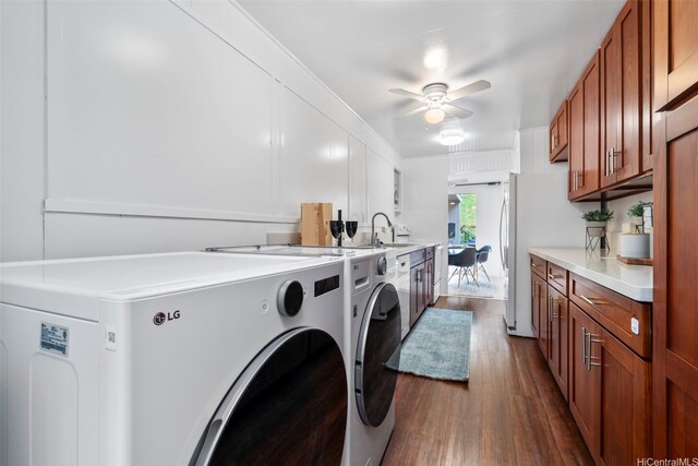 3657 Woodlawn Dr, Honolulu, HI 96822 - washroom with separate washer and dryer, dark wood-type flooring, and a ceiling fan