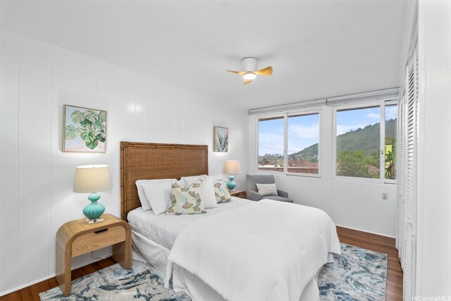 3657 Woodlawn Dr, Honolulu, HI 96822 - bedroom featuring wood finished floors and ceiling fan