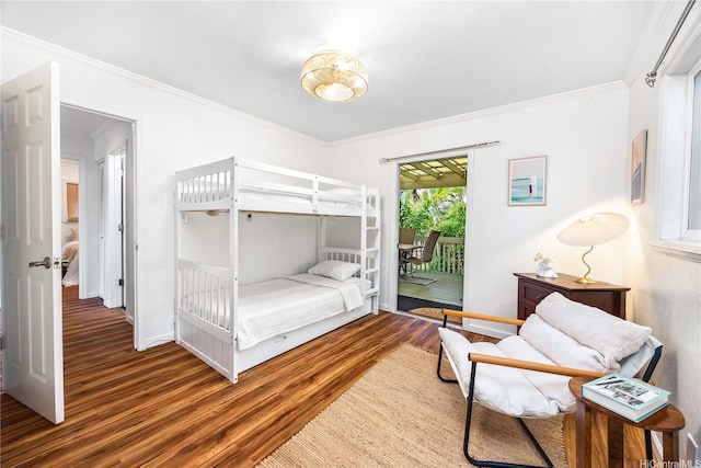 1408 Auwaiku St, Kailua, HI 96734 - bedroom featuring wood finished floors, access to outside, crown molding, and baseboards