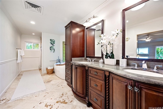 1408 Auwaiku St, Kailua, HI 96734 - bathroom featuring double vanity, ornamental molding, a bath, healthy amount of natural light, and ceiling fan