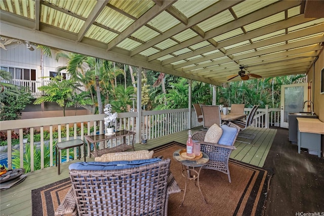 1408 Auwaiku St, Kailua, HI 96734 - wooden terrace featuring a ceiling fan and outdoor dining space