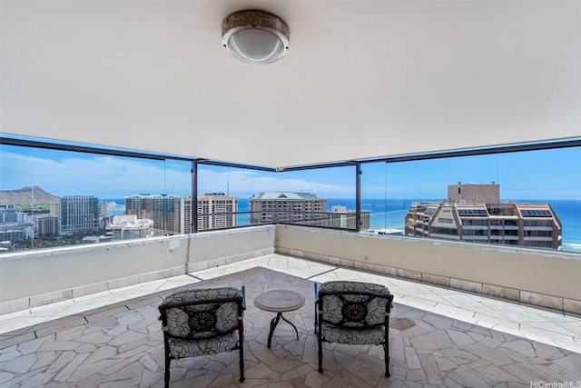 343 Hobron Ln Unit L103, Honolulu, HI 96815 - view of patio / terrace with a water view and a city view