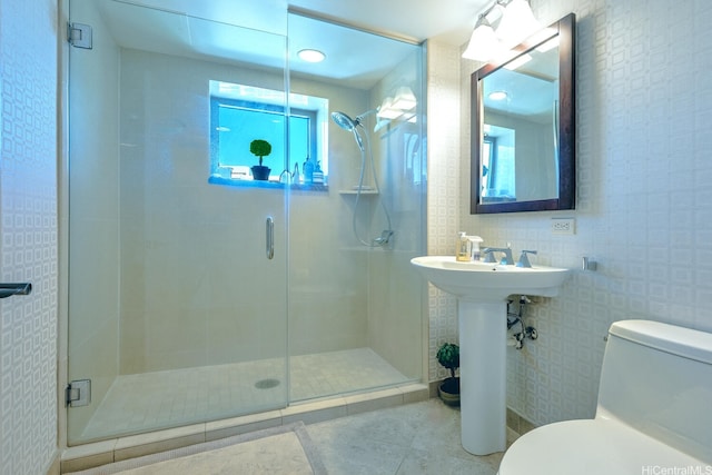 1551 Ala Wai Blvd Unit 2906, Honolulu, HI 96815 - bathroom with tile patterned flooring, toilet, a stall shower, and tile walls