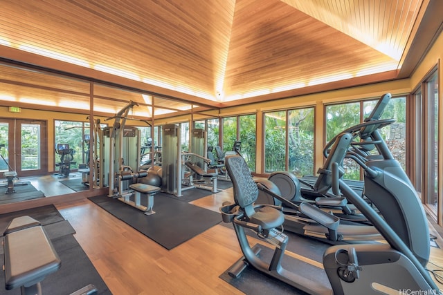 1551 Ala Wai Blvd Unit 2906, Honolulu, HI 96815 - workout area featuring healthy amount of natural light, french doors, wooden ceiling, and wood finished floors
