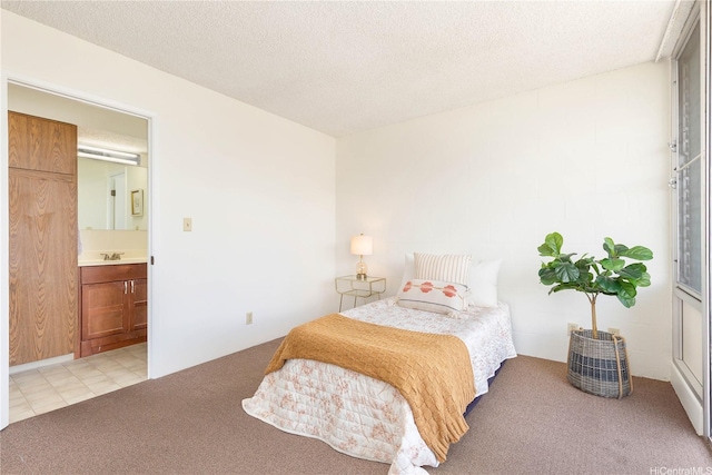 1122 Elm St Unit 809, Honolulu, HI 96814 - bedroom with light carpet, connected bathroom, and a textured ceiling