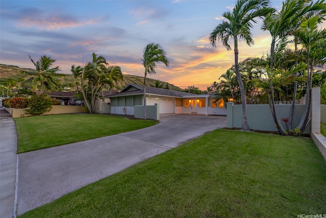 464 Poipu Dr, Honolulu, HI 96825 - view of front of property featuring concrete driveway and an attached garage