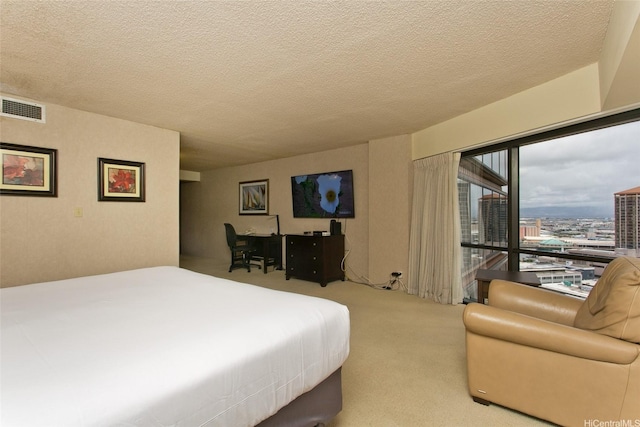 1088 Bishop St Unit 2201, Honolulu, HI 96813 - carpeted bedroom with a textured ceiling and access to outside