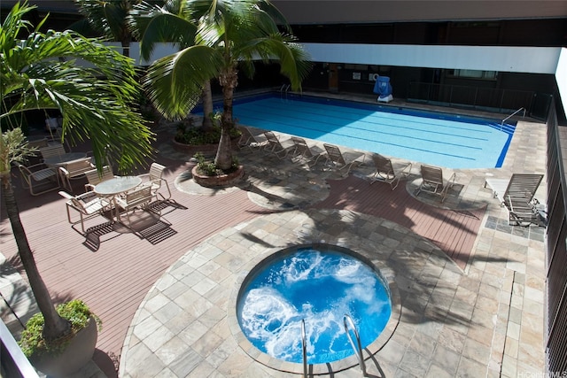 1088 Bishop St Unit 2201, Honolulu, HI 96813 - community pool with a hot tub and a patio
