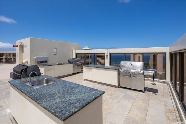 400 Hobron Ln Unit 2412, Honolulu, HI 96815 - view of patio / terrace with an outdoor kitchen and a sink