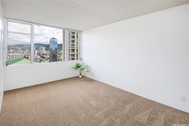 400 Hobron Ln Unit 2412, Honolulu, HI 96815 - carpeted empty room with a view of city
