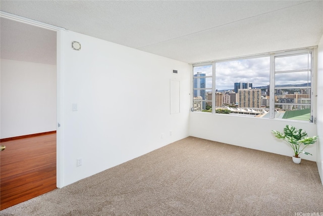 400 Hobron Ln Unit 2412, Honolulu, HI 96815 - carpeted empty room with a city view