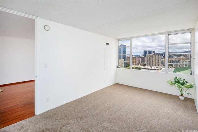 400 Hobron Ln Unit 2412, Honolulu, HI 96815 - carpeted empty room featuring a city view