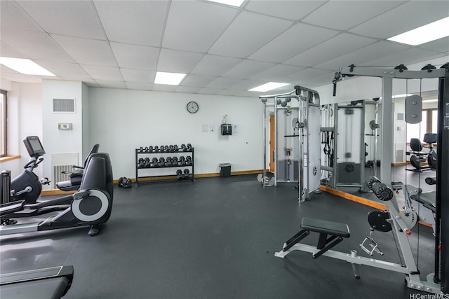 400 Hobron Ln Unit 2412, Honolulu, HI 96815 - workout area featuring a paneled ceiling and baseboards