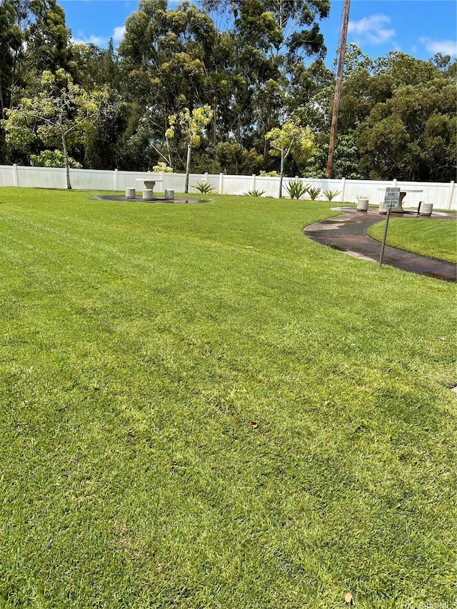 95-965 Ukuwai St Unit 3602, Mililani, HI 96789 - view of yard with view of wooded area