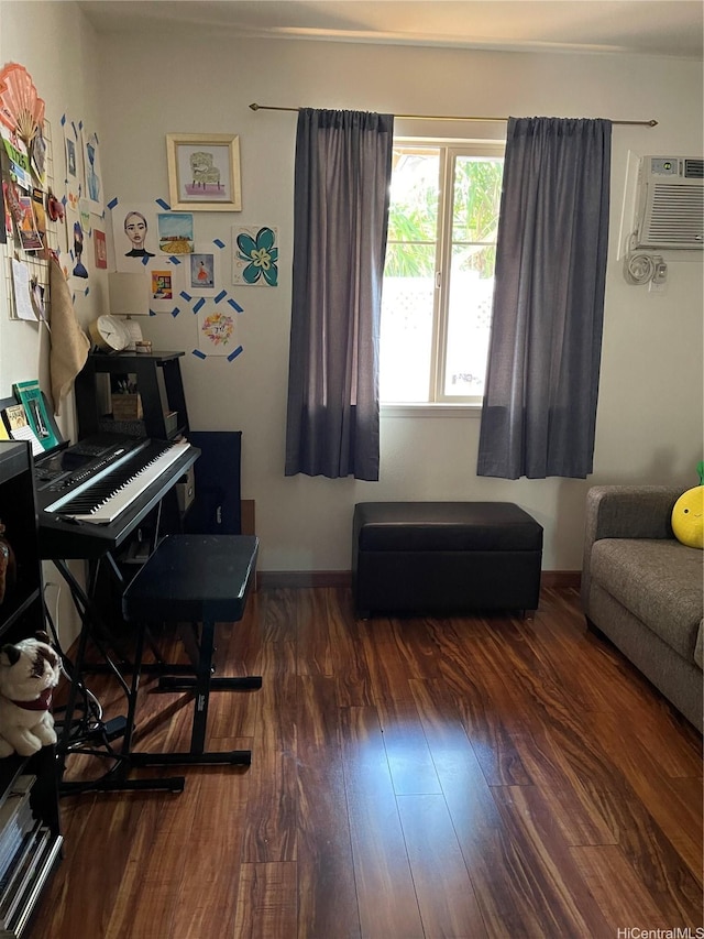 95-965 Ukuwai St Unit 3602, Mililani, HI 96789 - living area featuring an AC wall unit and wood finished floors