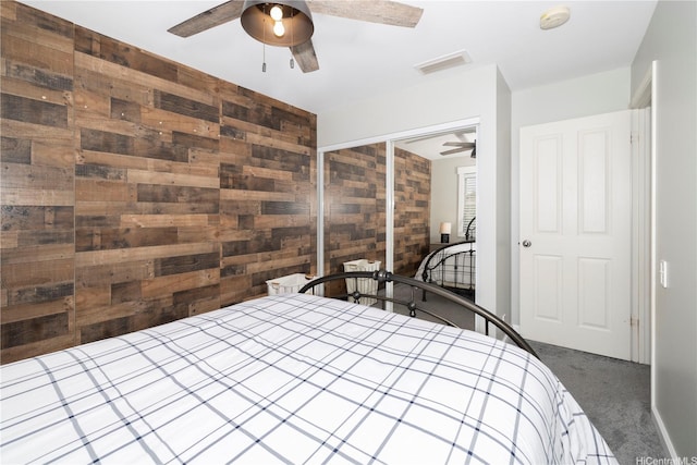 91-1013 Kailike St, Ewa Beach, HI 96706 - carpeted bedroom featuring wooden walls and a ceiling fan