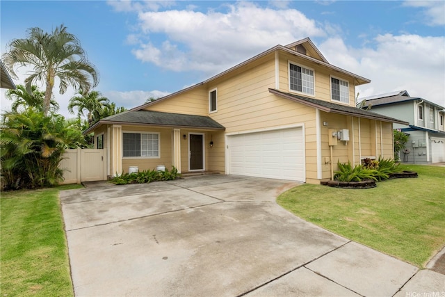 91-1013 Kailike St, Ewa Beach, HI 96706 - view of front facade with driveway and an attached garage