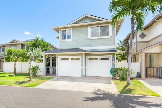 91-1083 Kanela St Unit T22, Ewa Beach, HI 96706 - view of front of house with driveway, a garage, and a shingled roof