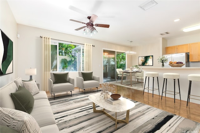 91-1083 Kanela St Unit T22, Ewa Beach, HI 96706 - living area featuring a ceiling fan, recessed lighting, and wood finished floors