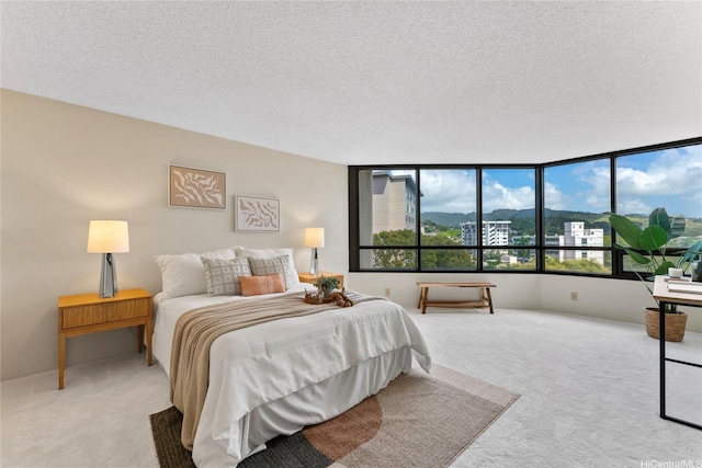 1525 Wilder Ave Unit 903, Honolulu, HI 96822 - bedroom featuring carpet floors and a textured ceiling