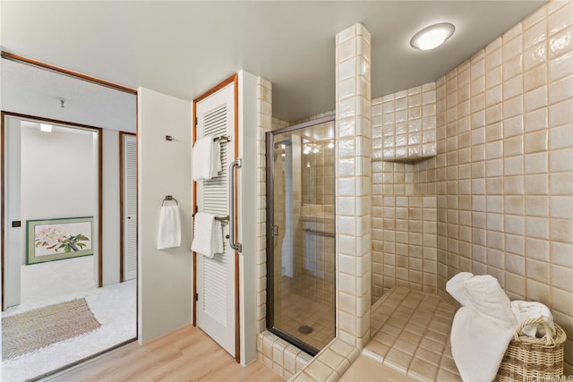 1525 Wilder Ave Unit 903, Honolulu, HI 96822 - bathroom featuring a shower stall and wood finished floors