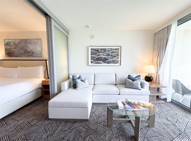 383 Kalaimoku St Unit 1807, Honolulu, HI 96815 - carpeted living area featuring plenty of natural light