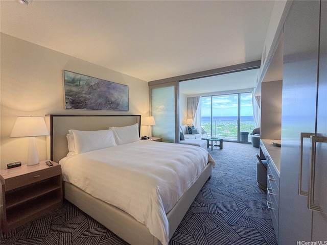 383 Kalaimoku St Unit 1807, Honolulu, HI 96815 - bedroom with carpet floors and access to outside