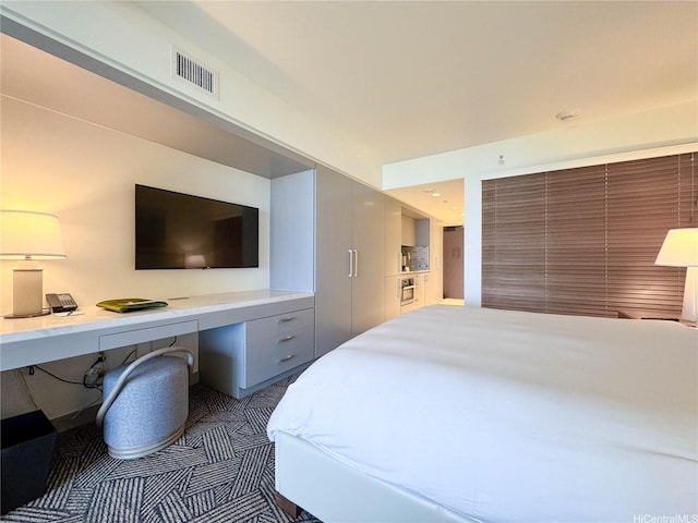 383 Kalaimoku St Unit 1807, Honolulu, HI 96815 - bedroom with built in study area