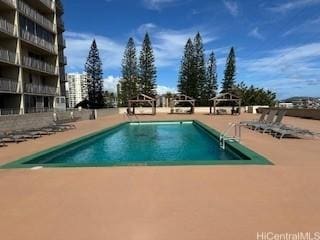 98-99 Uao Pl Unit 1710, Aiea, HI 96701 - community pool with a patio area