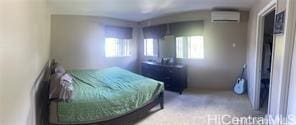 95-233 Halepule Pl Unit 44, Honolulu, HI 96789 - bedroom with a wall mounted AC and multiple windows