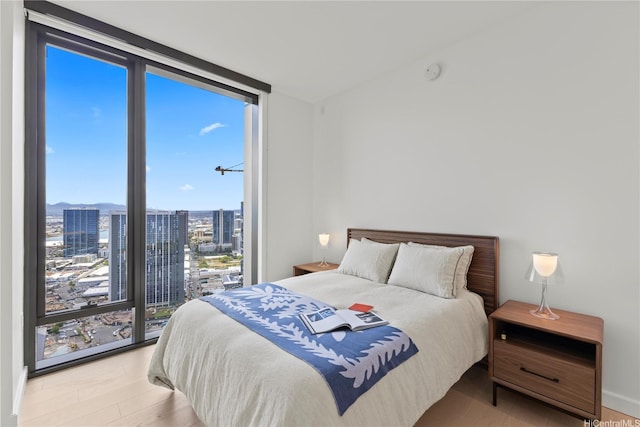 1100 Ala Moana Blvd Unit 3903, Honolulu, HI 96814 - bedroom with floor to ceiling windows, a city view, and access to outside