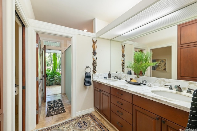 876 Aalapapa Dr Unit B, Kailua, HI 96734 - bathroom with double vanity, baseboards, and tile patterned floors