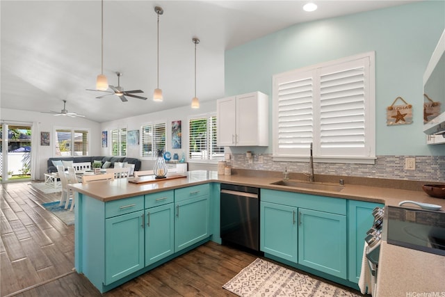 801 Kakala St Unit 50, Kapolei, HI 96707 - kitchen with stainless steel appliances, a sink, a peninsula, dark wood-type flooring, and open floor plan