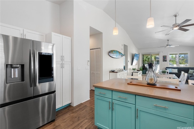 801 Kakala St Unit 50, Kapolei, HI 96707 - kitchen with stainless steel refrigerator with ice dispenser, open floor plan, dark wood-style flooring, vaulted ceiling, and ceiling fan