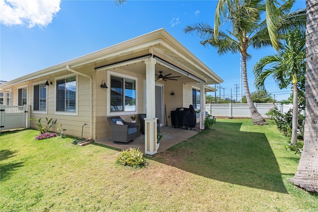 801 Kakala St Unit 50, Kapolei, HI 96707 - rear view of property with ceiling fan and a patio area