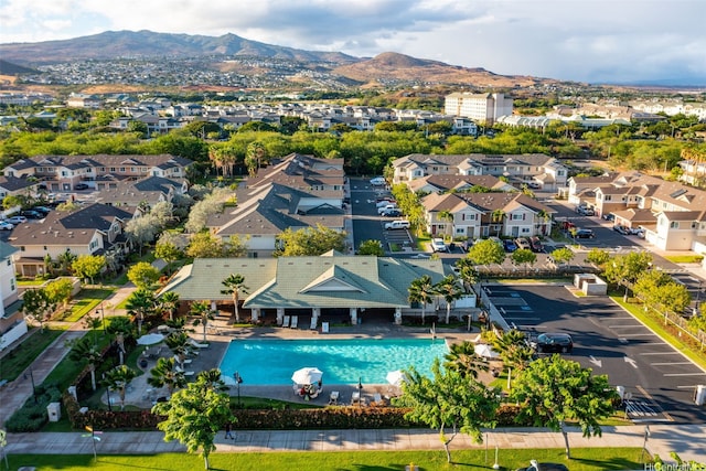 801 Kakala St Unit 50, Kapolei, HI 96707 - aerial perspective of suburban area featuring a pool and a mountain backdrop