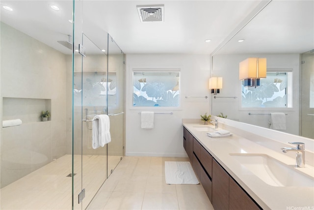 120 Hanapepe Loop, Honolulu, HI 96825 - bathroom featuring double vanity, plenty of natural light, a stall shower, recessed lighting, and tile patterned flooring