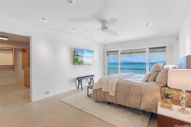 120 Hanapepe Loop, Honolulu, HI 96825 - bedroom with access to outside, light tile patterned flooring, a ceiling fan, baseboards, and a spacious closet