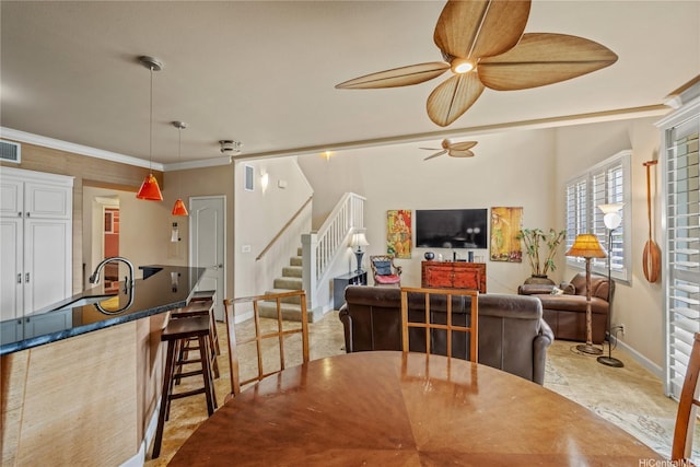92-1037D Koio Dr Unit M1-4, Kapolei, HI 96707 - dining room featuring a ceiling fan, stairway, baseboards, and crown molding