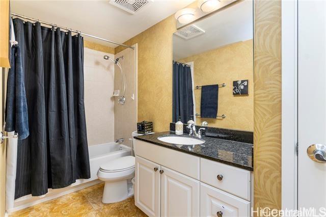92-1037D Koio Dr Unit M1-4, Kapolei, HI 96707 - full bathroom featuring vanity, toilet, shower / bath combo with shower curtain, and tile patterned floors